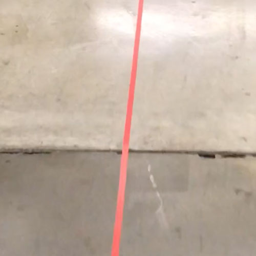 A red line taped on the floor